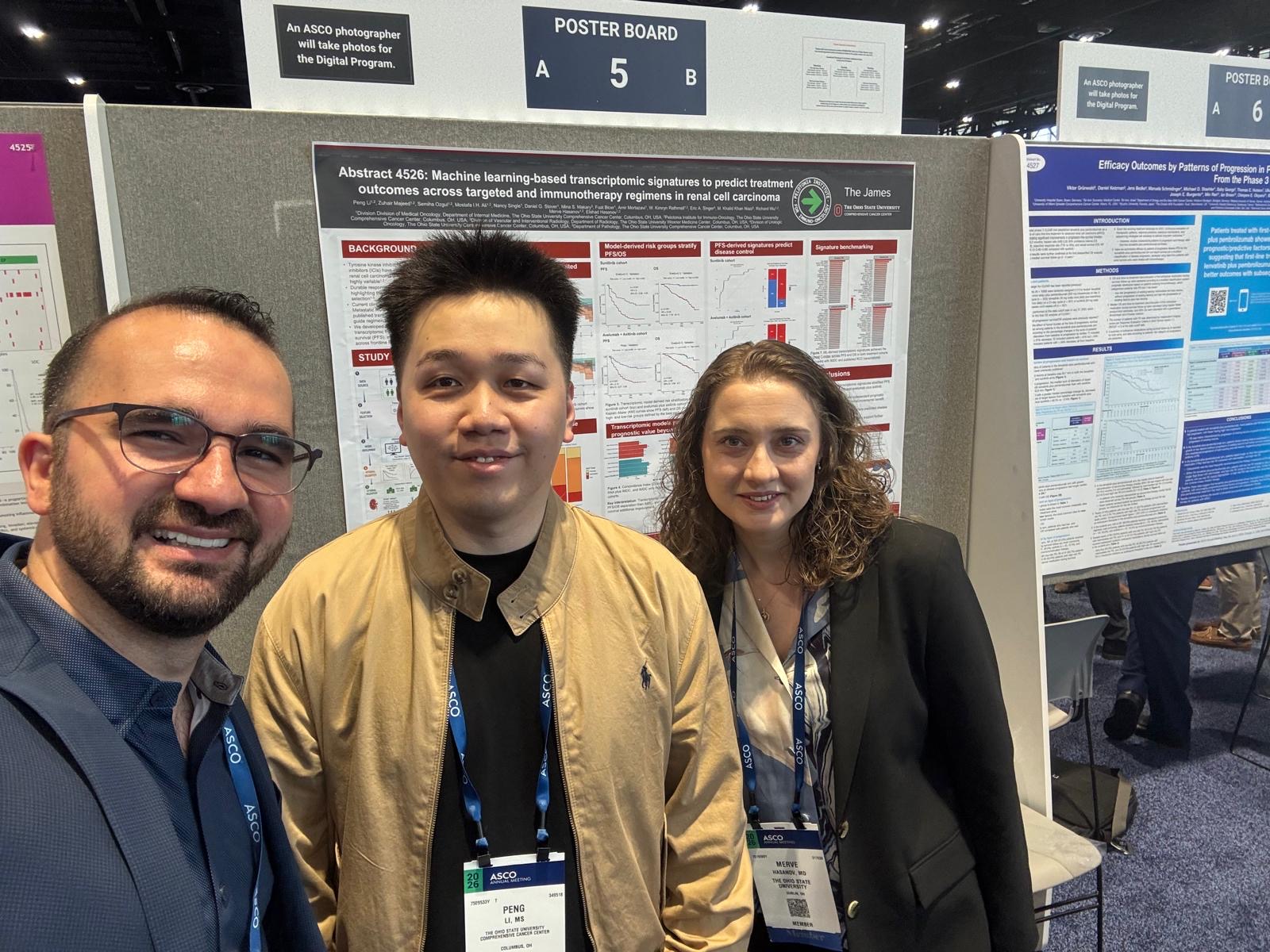 Peng Li with colleagues in front of the ASCO 2026 poster board